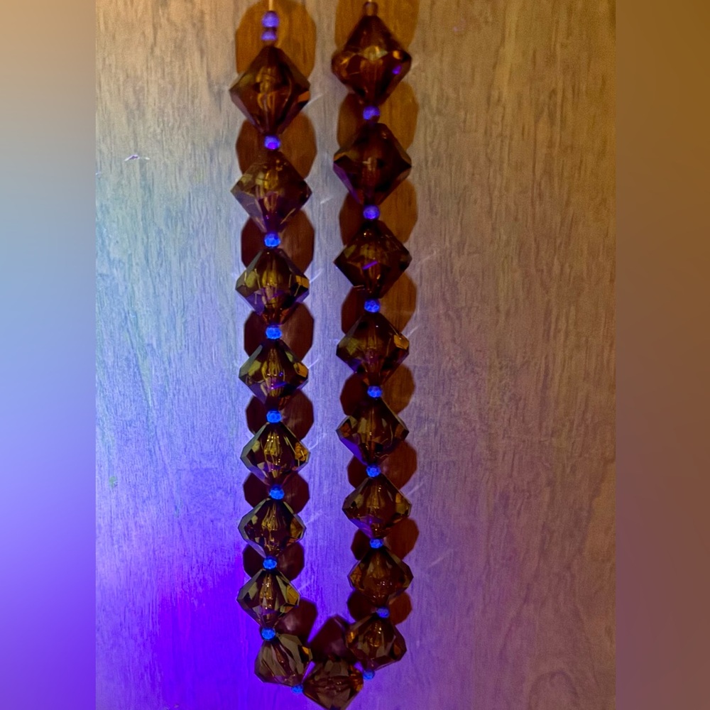 Vintage Amber Czech Glass beads. 
Small amber beads “blue amber” under UV Light
